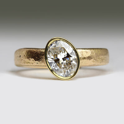 22ct Yellow Gold Sandcast Ring with Bezel Set Oval Diamond