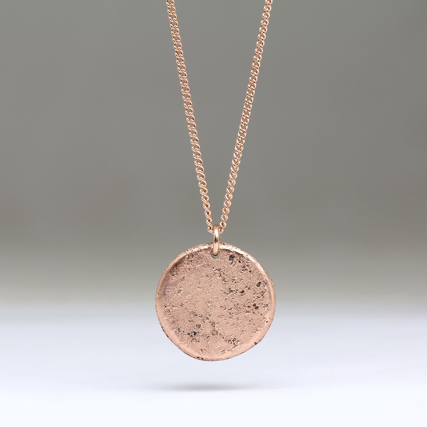 Rose gold disc on sale pendant