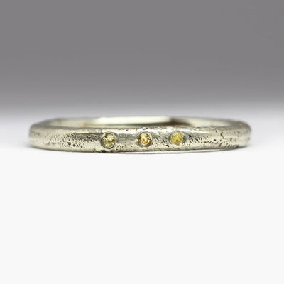 9ct White Gold Sandcast Ring with Trio of Yellow Sapphires