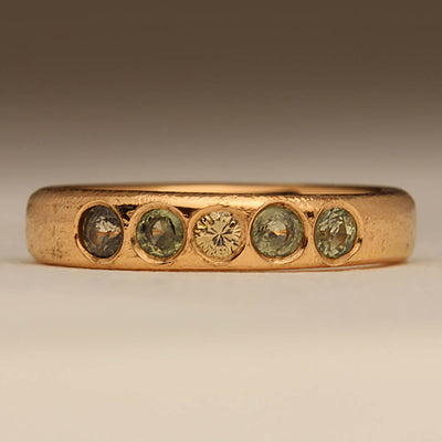 18ct Red Gold Sandcast Ring with Green Sapphires and Champagne Diamond