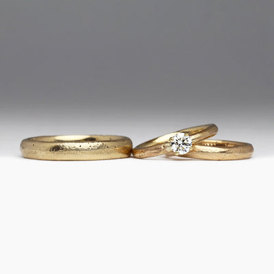 Diamond Solitaire Engagement Ring with Set of Wedding Rings in Sandcast 9ct Yellow Gold