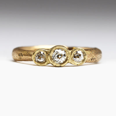 22ct Gold Sandcast Engagement Ring with Trio of Bezel Set Old Cut Diamonds