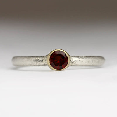 Fine Silver Sandcast Ring with Yellow Gold Setting and Red Garnet