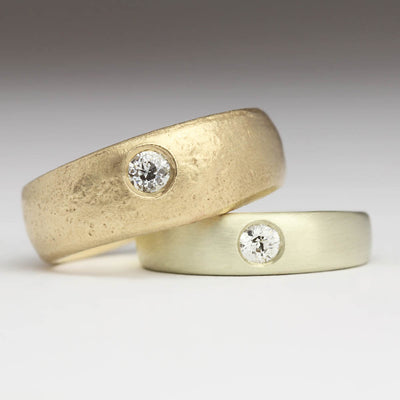 Pair of Wedding Rings in 9ct Yellow and White Gold, with Flush Set Diamonds