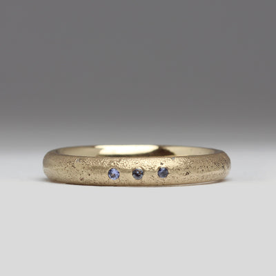 9ct Yellow Gold Sandcast Ring with Trio of Sapphires Flush Set