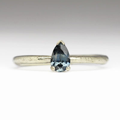 Grey-Teal Pear Cut Montana Sapphire Sandcast 9ct White Gold Ring