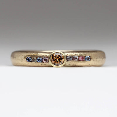Sandcast Engagement Ring Cast in Own 9ct Yellow Gold with Bezel Set Brown Diamond & Channel Set Montana Sapphires