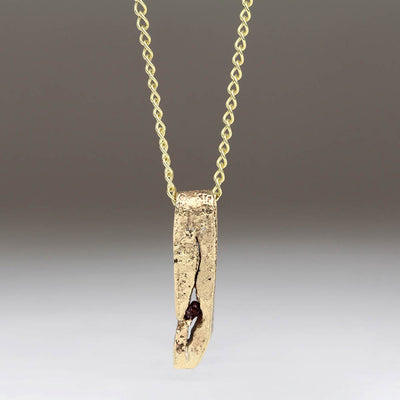 Sandcast Pendant in 9ct Yellow Gold with Uncut Garnet
