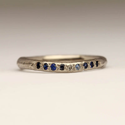 Shaped Sandcast Ring in 18ct White Gold with Pavé Set Sapphires and Central Champagne Diamond