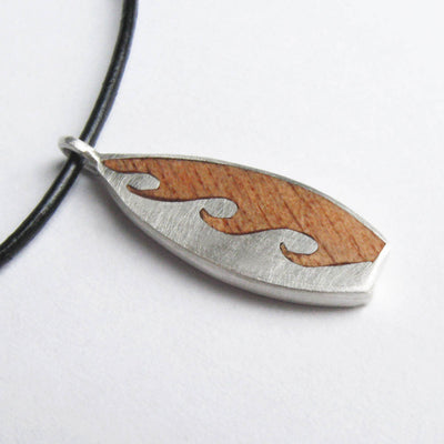 Silver and Yew Boat Pendant