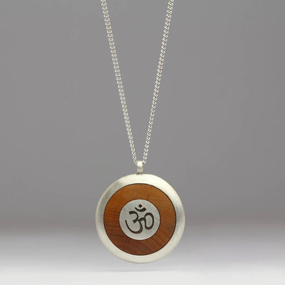 Silver and Yew Pendant with Om Symbol Laser Engraved in Centre
