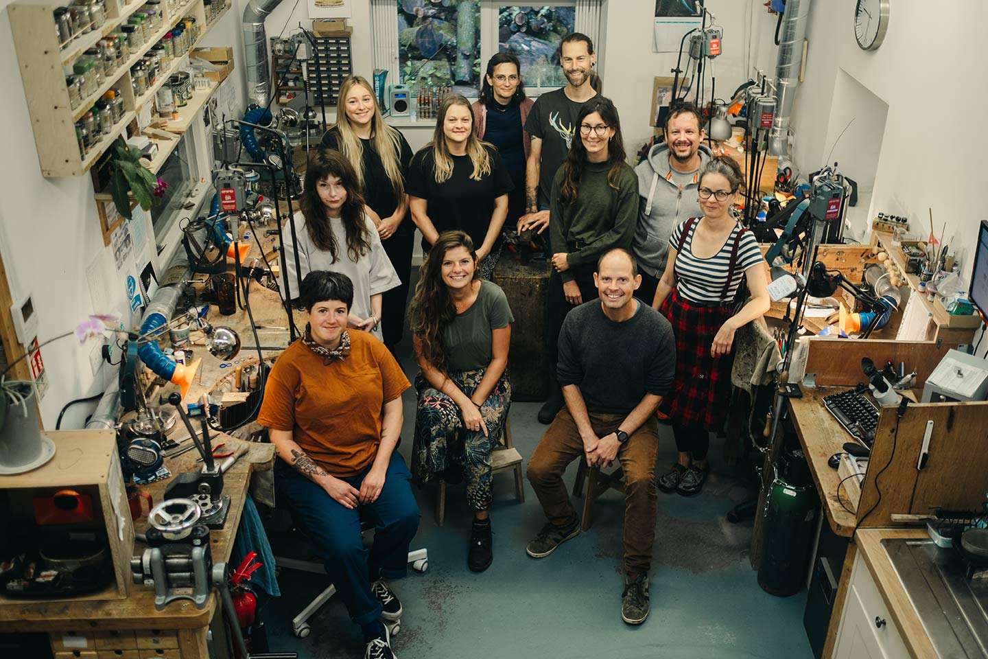 Justin Duance Team: all nine of us in the workshop smiling at the camera